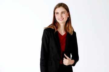 Portrait closeup isolated studio shot of Caucasian confident smart professional successful long hair female businesswoman in formal working suit standing smiling on white background