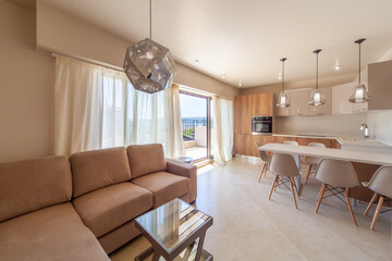 New modern living room with kitchen. New home. Interior photography.