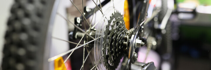 Closeup of bicycle cassette on wheel in workshop