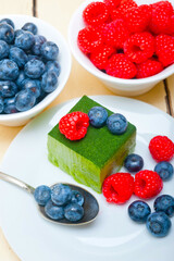 green tea matcha mousse cake with berries