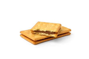 Cracker sandwich with chocolate filling isolated on white background.