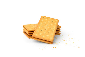 Pile of cracker sandwiches with chocolate filling isolated on white background.