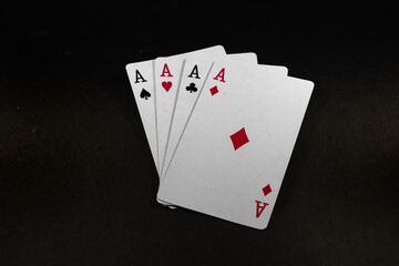 Playing cards isolated on black background