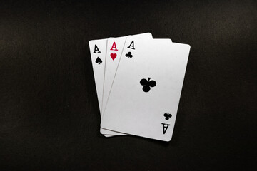 Playing cards isolated on black background
