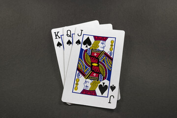 Playing cards isolated on black background