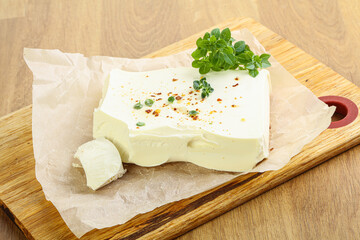 Greek Feta cheese over board