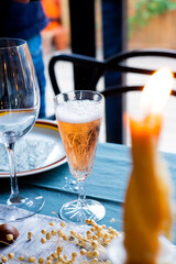 A kir cocktail with champagne at a festive table