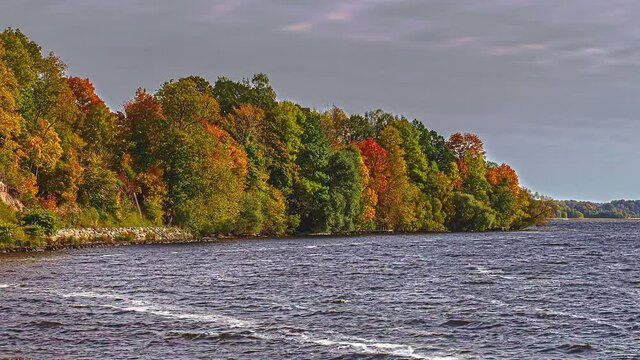 Timelapse at the shore of Daugava River in Daugavas Loki Latvia during autumn