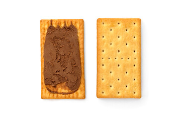 Cracker sandwich with chocolate filling isolated on white background.