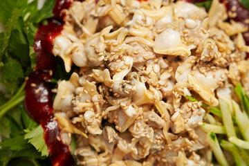  boiled cockle , vegetables seasoned with vinegar and other condiments