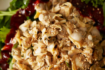 boiled cockle , vegetables seasoned with vinegar and other condiments