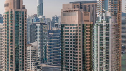 Fototapeta na wymiar Dubai Marina Skyline with JLT district skyscrapers on a background aerial timelapse.