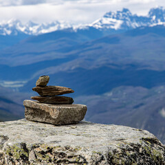 stacked stones on top of a mountain