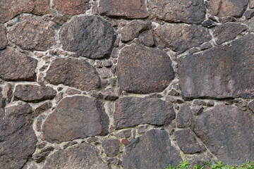 the texture of the finishing stone on the wall. Natural stone