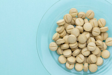 Homeopathic pill supplement. Alternative Medicine. Vitamin capsules.