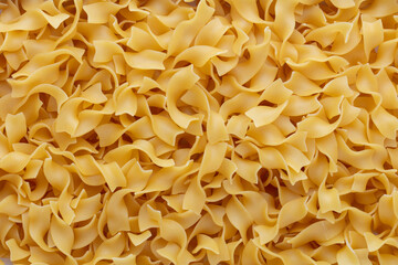 Raw pasta isolated on white background.
