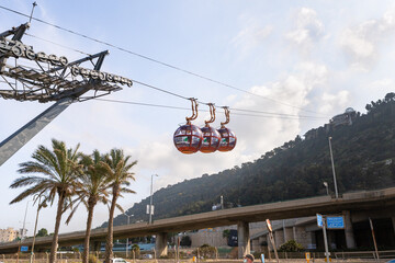 Cable car cabins leave from the lower station on the waterfront in Haifa city, in northern Israel