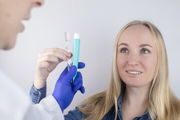 The dentist advises the girl on how to brush her teeth properly. The doctor teaches and explains....