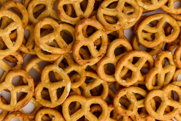 Mini salty pretzels isolated on white background.