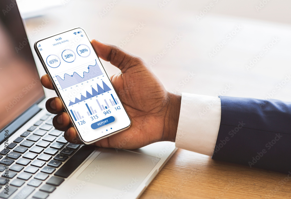 Aufkleber black manager using mobile phone with trading app