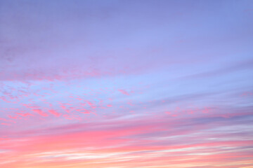 Beautiful sky, purple, violet, pink, coral, orange, cream vanilla colours. Cirrus clouds morning sky