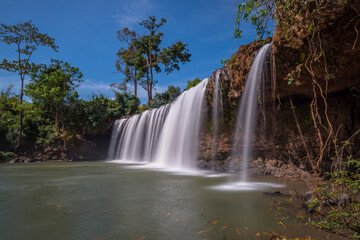 Time: Sunday morning, December 12, 2021. Location: Binh Phuoc province.  Landscape photo: Dac Mai waterfall 