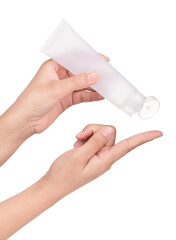 Hand holding blank squeeze bottle plastic tube isolated on white background.