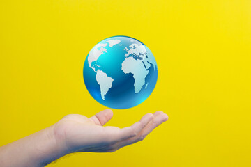 hand holding earth