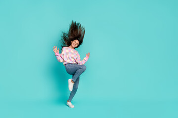 Full length body size view of charming cheery girl dancing having fun isolated over bright teal turquoise color background