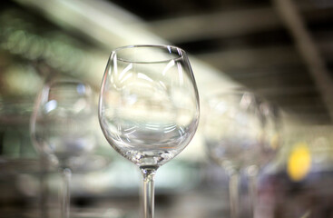 Glass glasses and wine glasses on the shelf of the store