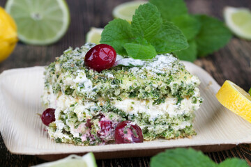 green cake with cream and lime