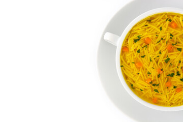 Chicken noodle soup in white bowl isolated on white background. Top view. Copy space