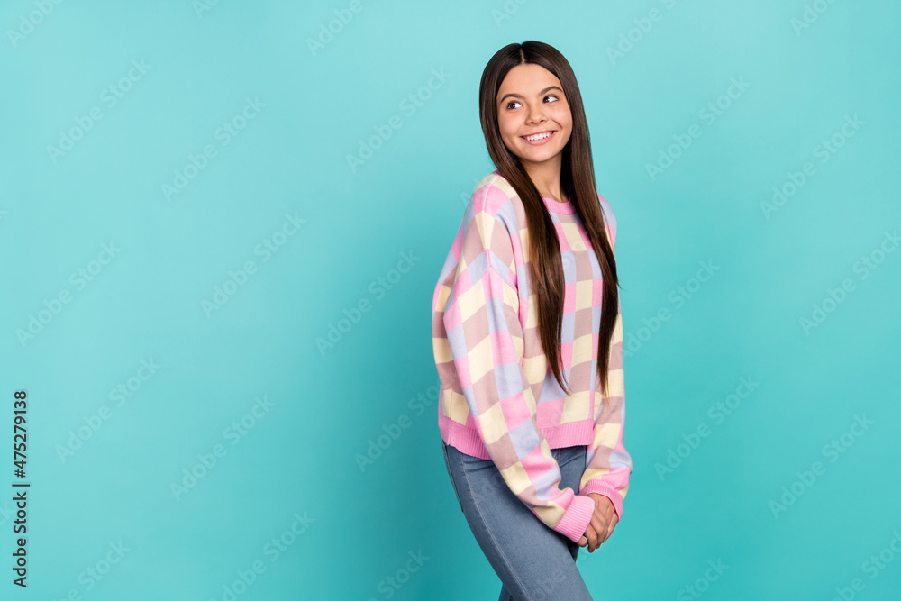 Sticker photo of sweet shiny school girl dressed prink pullover looking back empty space isolated teal color