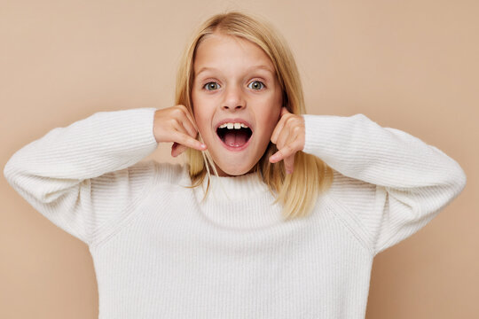 Little cute girl communication smartphone entertainment posing studio