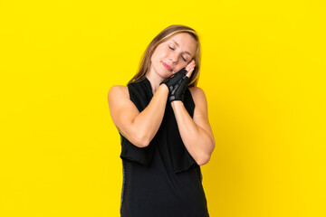 Young sport English woman isolated on white background making sleep gesture in dorable expression