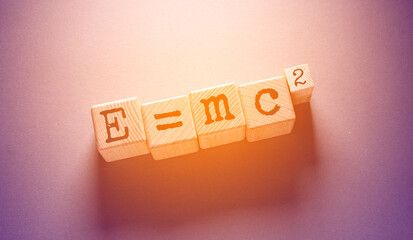 E = mc 2 Word with Wooden Cubes