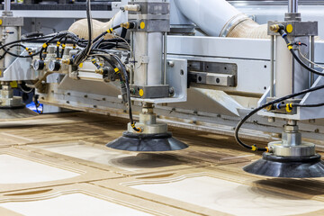 production of kitchen facades on a drilling and filler machine