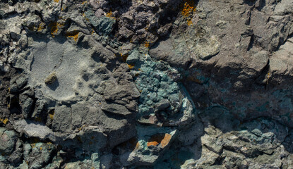 Volcanic rock with the presence of iron and copper.