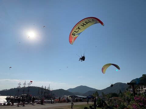 Paragliding in Turkey. Powder sports - paragliding. Skydiving on the background of the sky. Turkey, Mount Babadag, Oludeniz, August 8, 2021