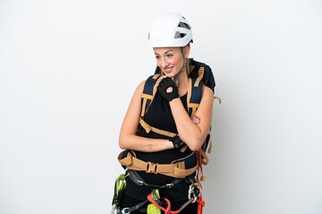 Young caucasian rock climber woman isolated on white background looking to the side