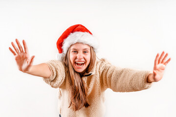 A little girl in a Santa's Christmas hat is laughing and fooling around with her arms outstretched to the screen, a banner with a place for text. Wow.