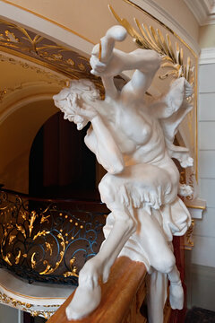 The Satyr with pipe statue near staircase in the hall of the Odessa Opera and Ballet Theater, Ukraine