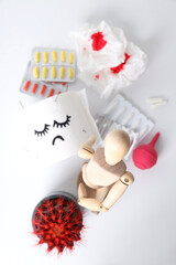 Concept of healthcare with hemorrhoids accessories on white background