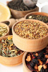 Concept of cooking tea with different types of tea on white background