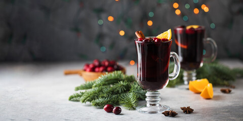 Banner of glasses of mulled wine on a Christmas background. Copy space.