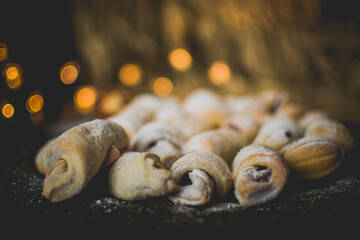 Christmas bakery on a plate with bokeh lights in background