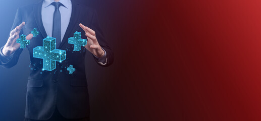 Businessman hand holding 3D plus low polygonal icon.Plus sign virtual means to offer positive thing like benefits, personal development, social network Profit,health insurance, growth concepts.