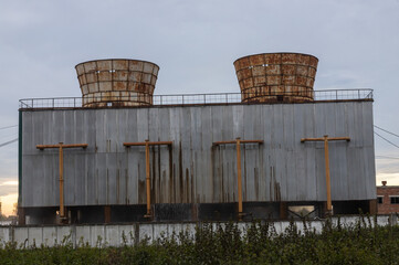 Industrial landscape. smoking chimneys CHP against a blue sky. Heat power station