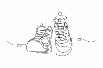 Papier Peint photo autocollant Une ligne Continuous line drawing of man work boots. Single one line art of safety hiking boots. Vector illustration