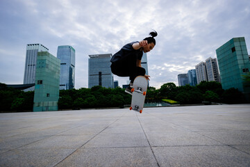 Skateboarder skateboarding outdoors in city © lzf